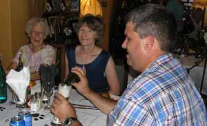 Big smiles from June Robertson, Linda and Dave Lamb